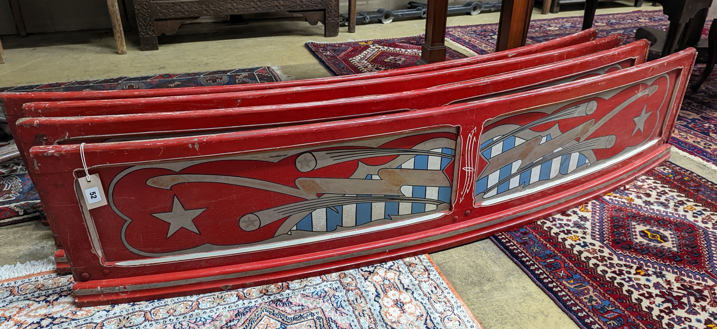 Four vintage painted fairground boards. Length-183cm, Height-39cm.